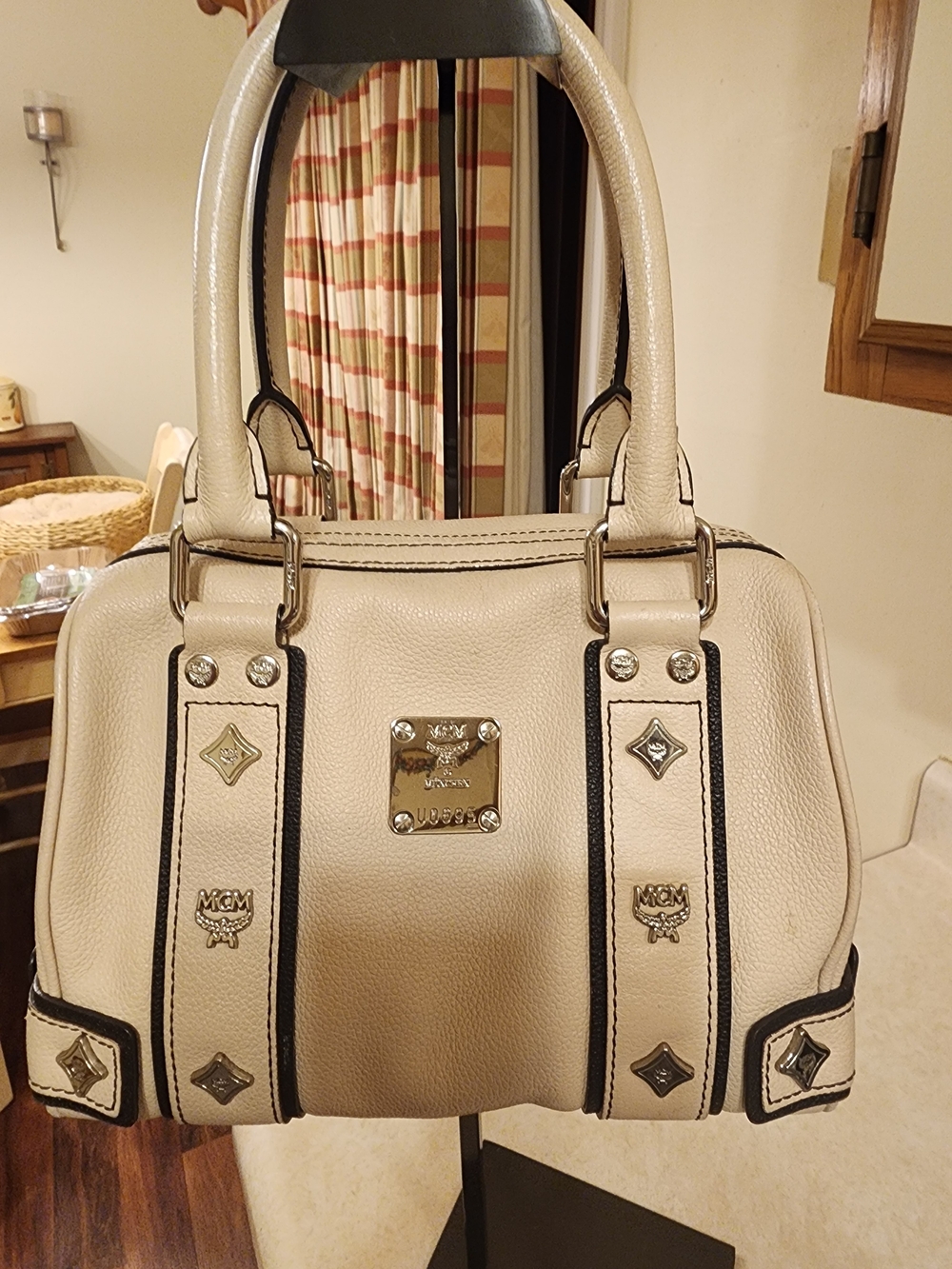 MCM cream leather Boston satchel featuring silver-toned hardware